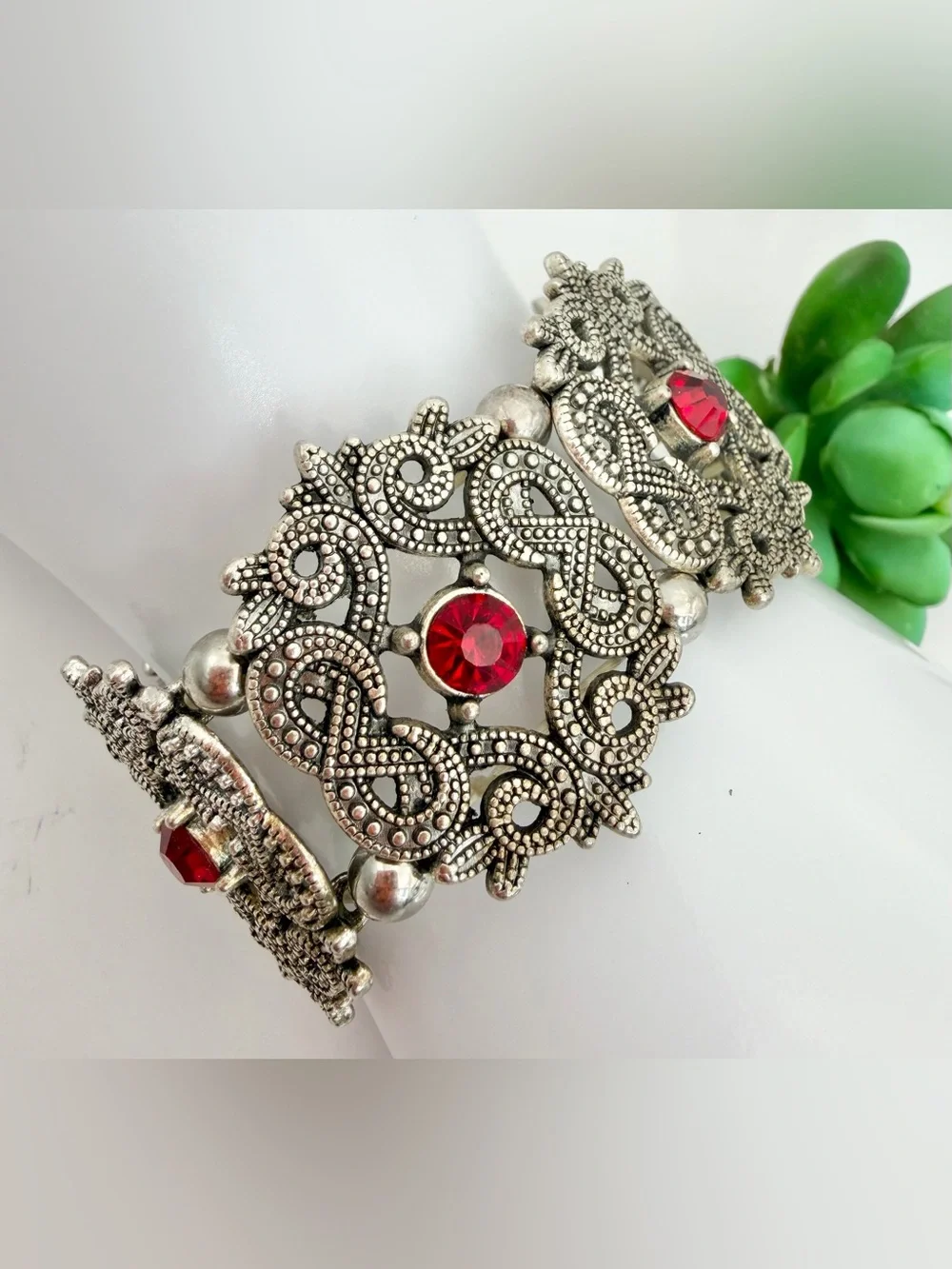 Vintage-Inspired Silver Tone Bracelet with Red Crystal Accents